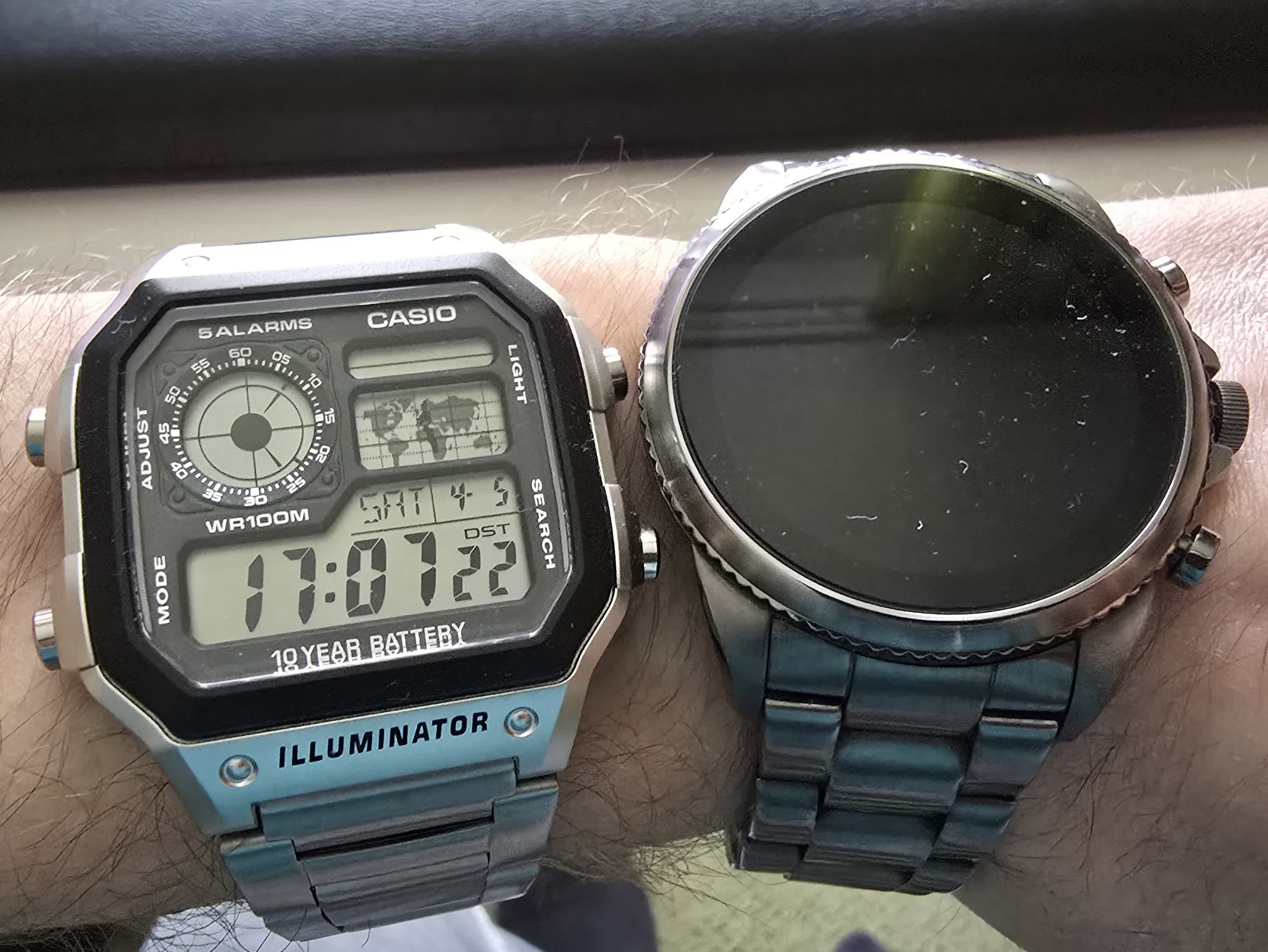 A photo of my new Casio watch and my old smartwatch